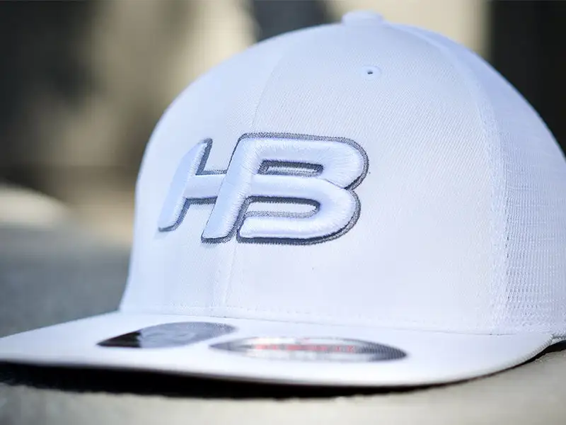 HB Sports Headbanger Sports I8501 Cap America Flexfit Performance Trucker Mesh Back Hat: Whiteout 4 HB Sports Headbanger Sports I8501 Cap America Flexfit Performance Trucker Mesh Back Hat: Whiteout - Image 2