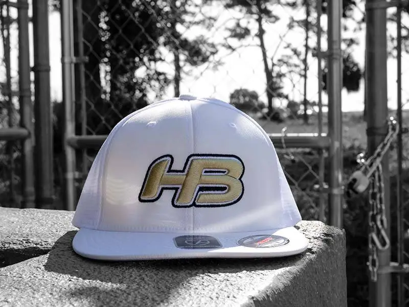 HB Sports Headbanger Sports I8501 Cap America Flexfit Performance Trucker Mesh Back Hat: White & Gold 4 HB Sports Headbanger Sports I8501 Cap America Flexfit Performance Trucker Mesh Back Hat: White & Gold - Image 2